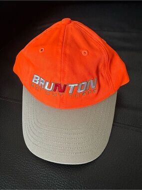 Unworn Brunton Get Out There Blaze Orange Adjustable Peaked Hat. small blemish